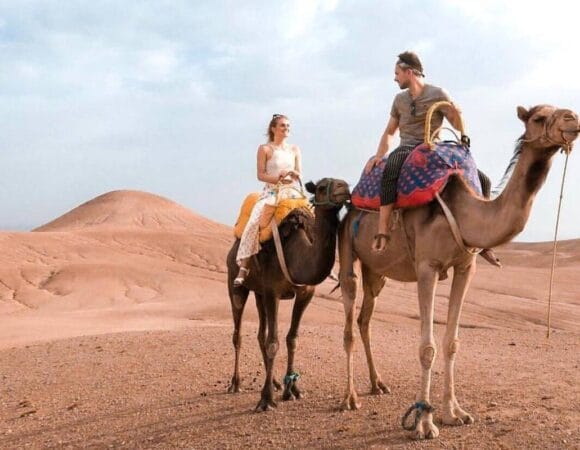 Agafay Desert Package Tour: Quad Biking, Camel Ride, Tea, and Dinner Experience