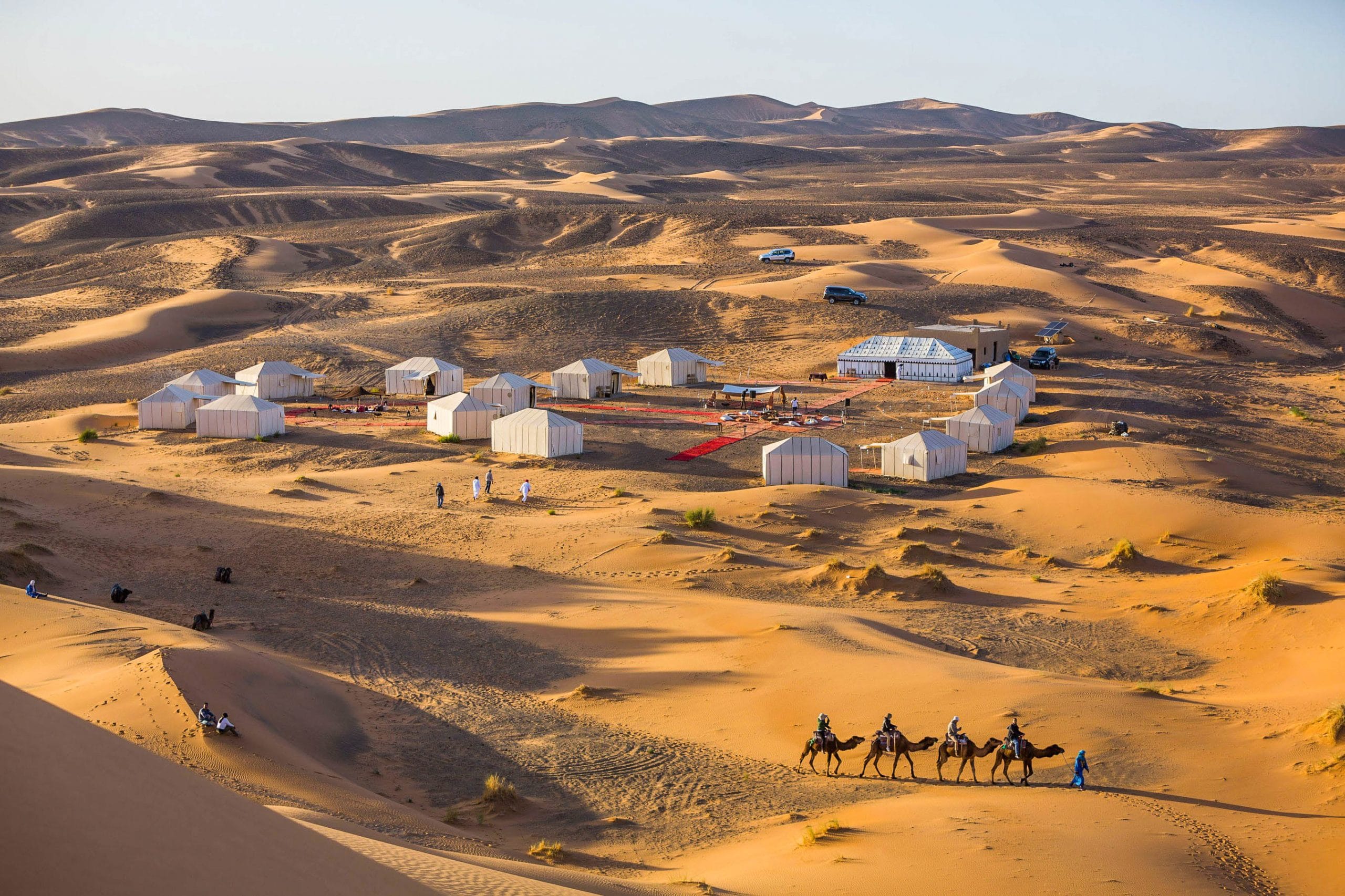 A stay at a Morocco Desert Luxury Camp is more than just accommodation; it’s an all-encompassing experience. By day, ride camels or quad bikes across the dunes,